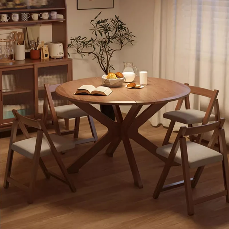 Runder Tisch mit zwei Klappblättern aus massivem Holz