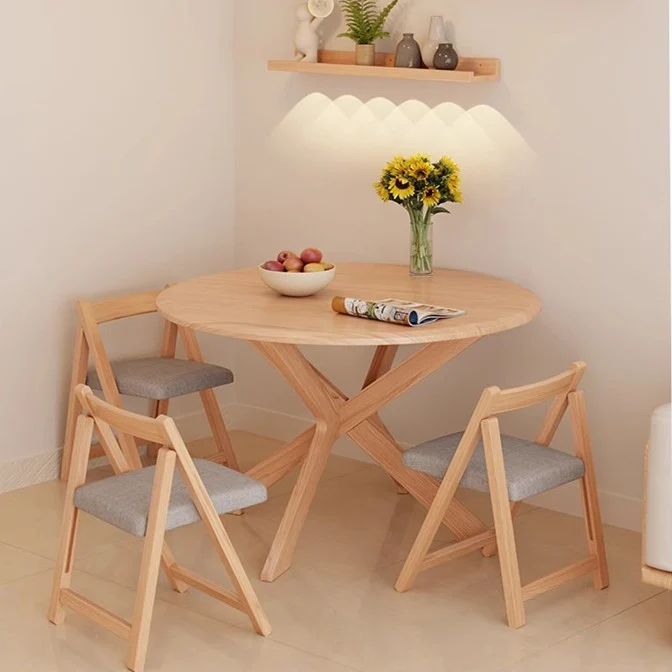 Runder Tisch mit zwei Klappblättern aus massivem Holz