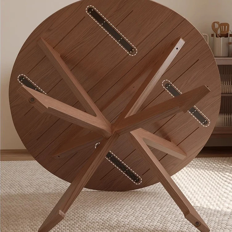 Runder Tisch mit zwei Klappblättern aus massivem Holz