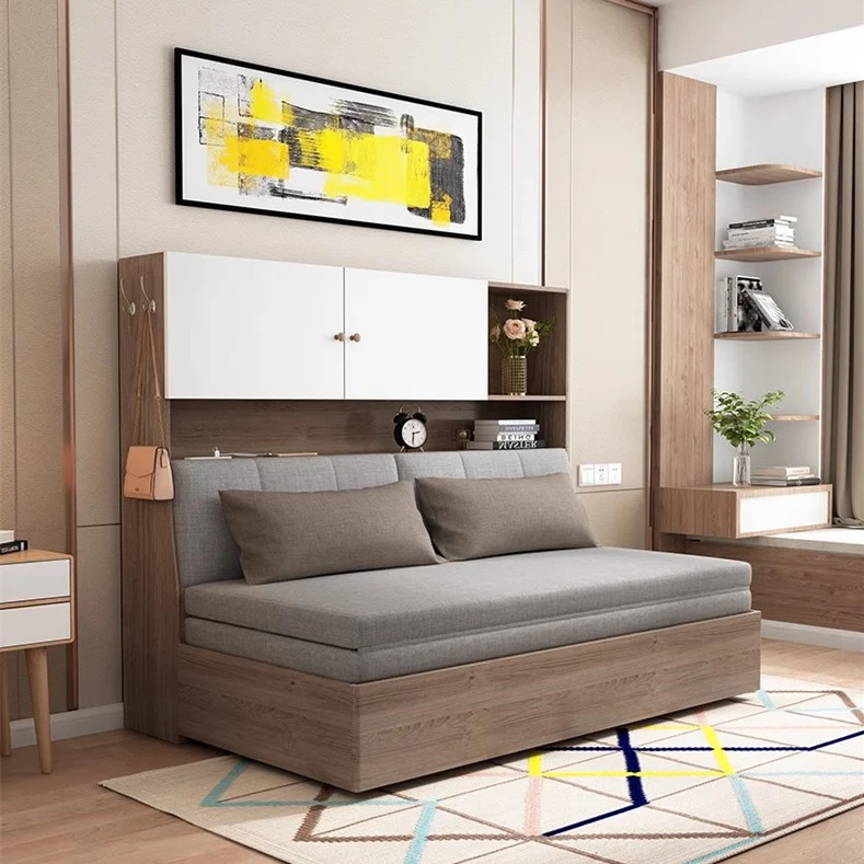 Schlafsofa mit Stauraum darunter und Bücherregal