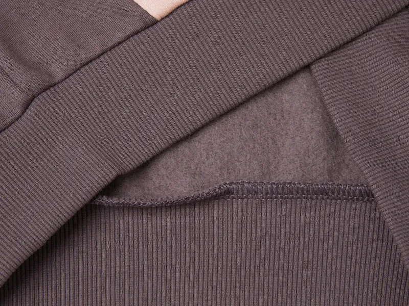 Sweater mit Reißverschluss und Pailletten
