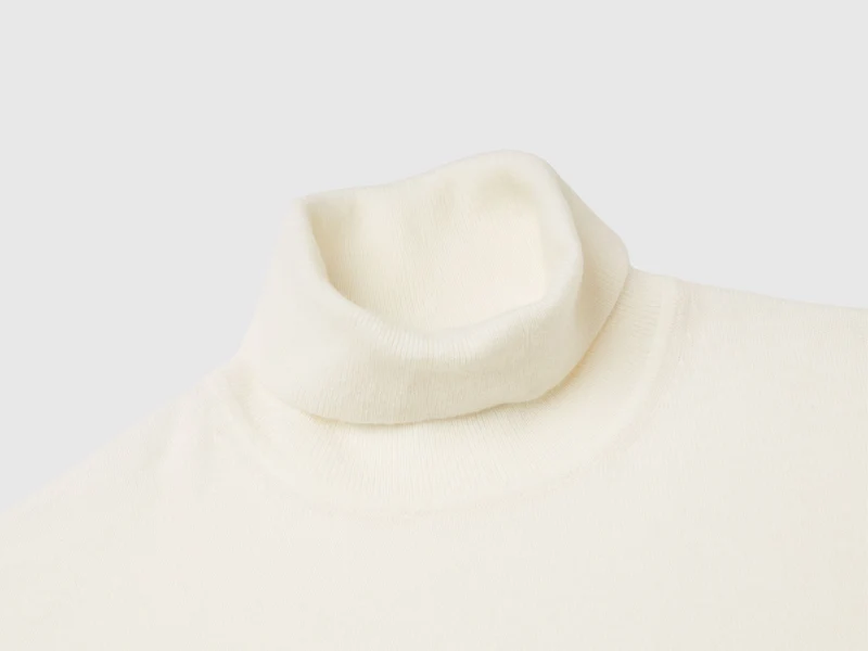 Cremefarbener Rollkragenpullover aus reiner Merinowolle