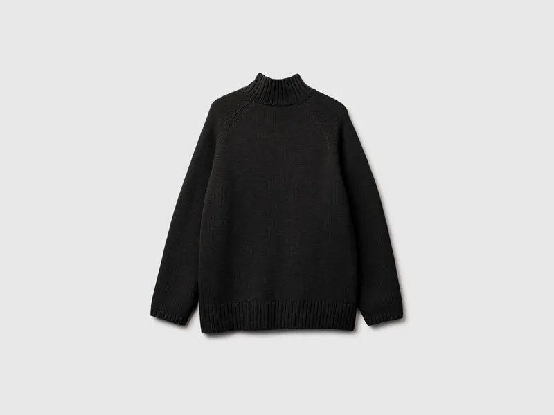 Oversize-Rollkragenpullover mit Fransen