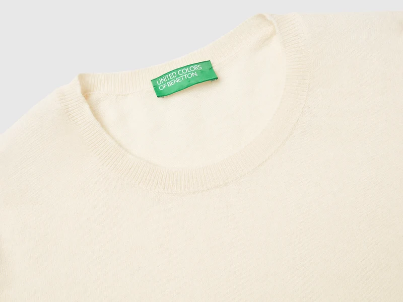 Cremefarbener Kurzarmpullover aus reiner Merinowolle