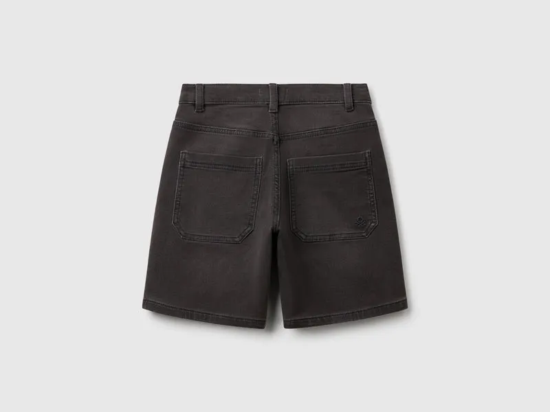 Stretch denim Bermuda shorts
