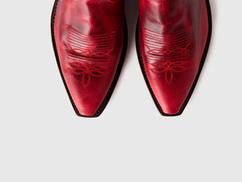 Hohe rote Texan-Stiefel